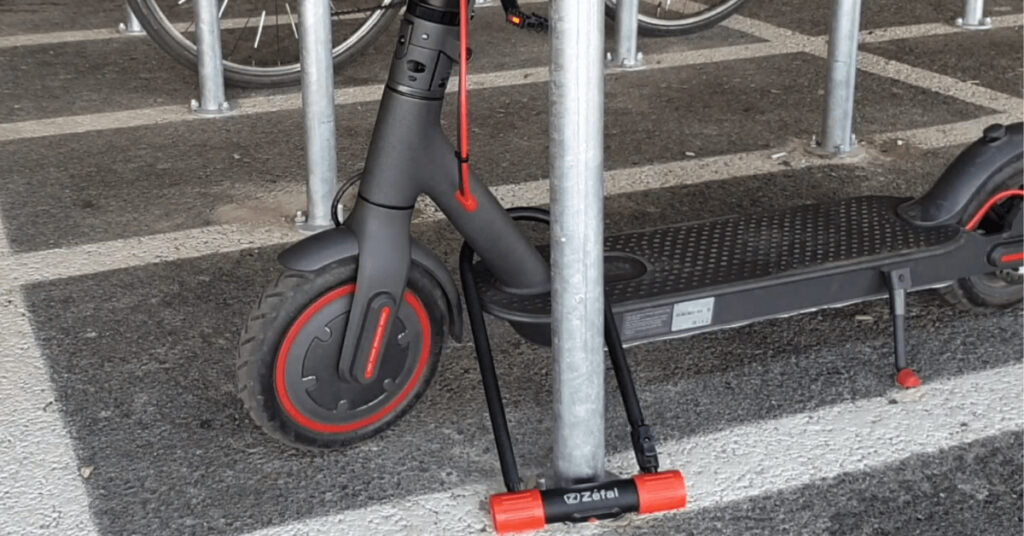 electric scooter is locked using u-lock