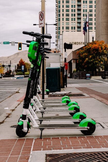 Lime rental electric scooters standing in the row