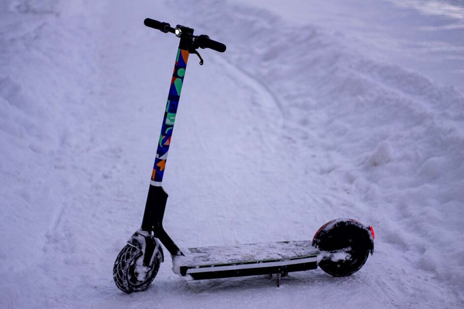 Tuul electric scooter on the snowy street.