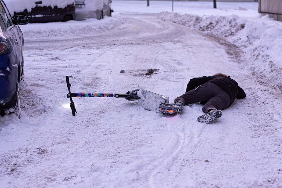 the man fell off the electric scooter due to slipperiness