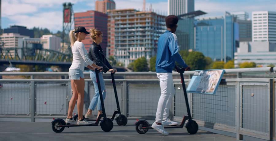 People with electric scooters