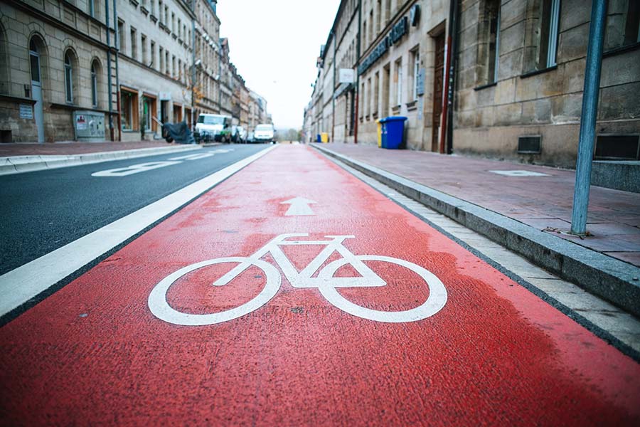 red colored bicycle lane