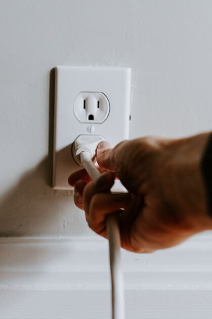 pluging the cable in the wall