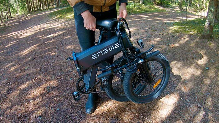 lifting my folding electric bike into the trunk of the car