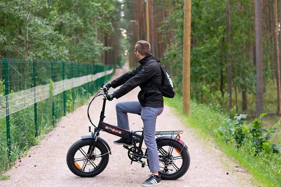 man riding with a Chinese electric bike Engwe EP-2 Pro
