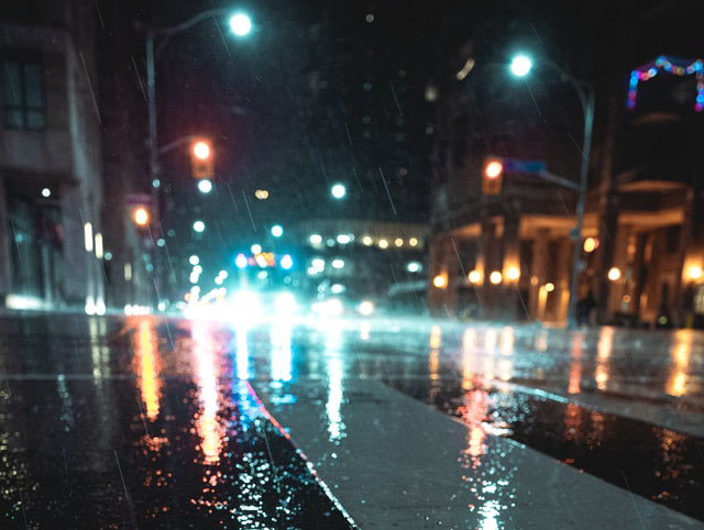 The rainy street in the dark