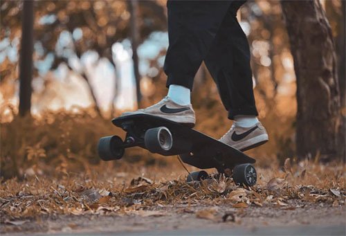 skateboarder jumps with a Meepo Mini 2