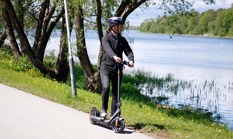 team member of Electric Wheelers testing the Niu electric scooter