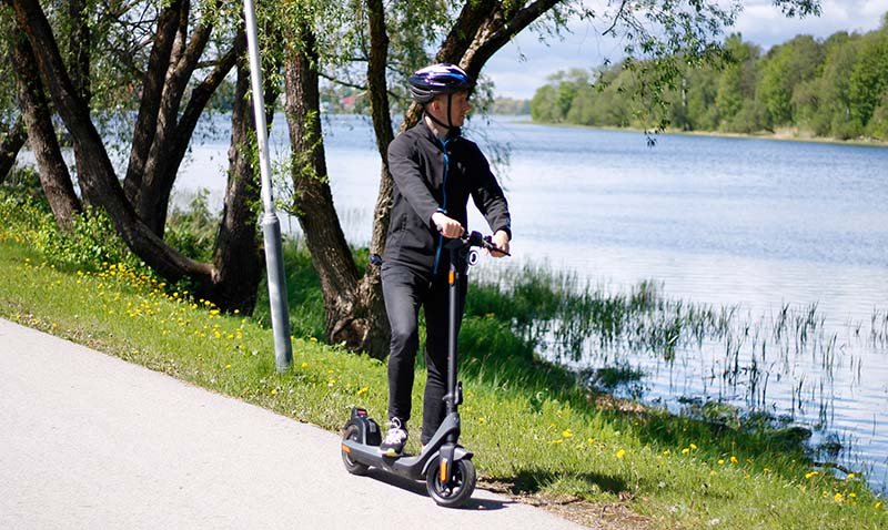 team member of Electric Wheelers testing the Niu electric scooter