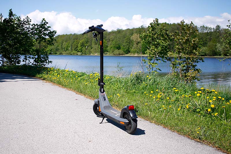 NIU KQi2 scooter by the river