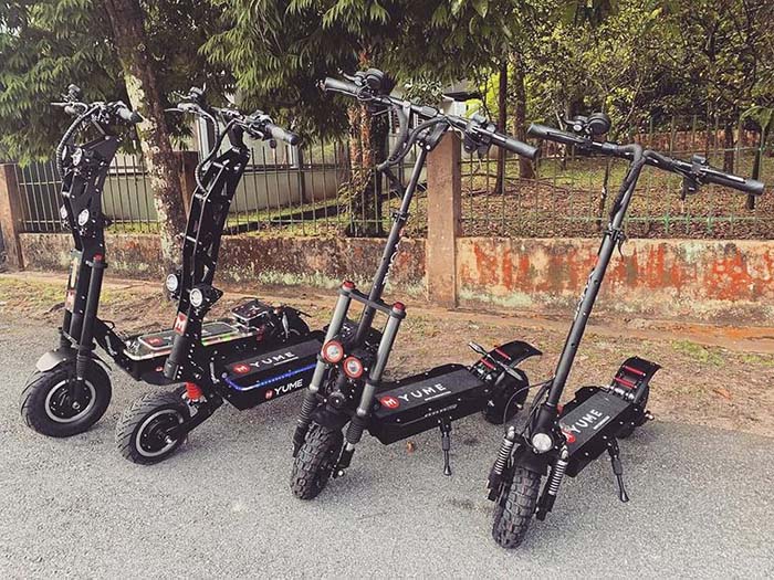 Yume electric scooters in a row - X7, M11 Pro, Y11, and D5