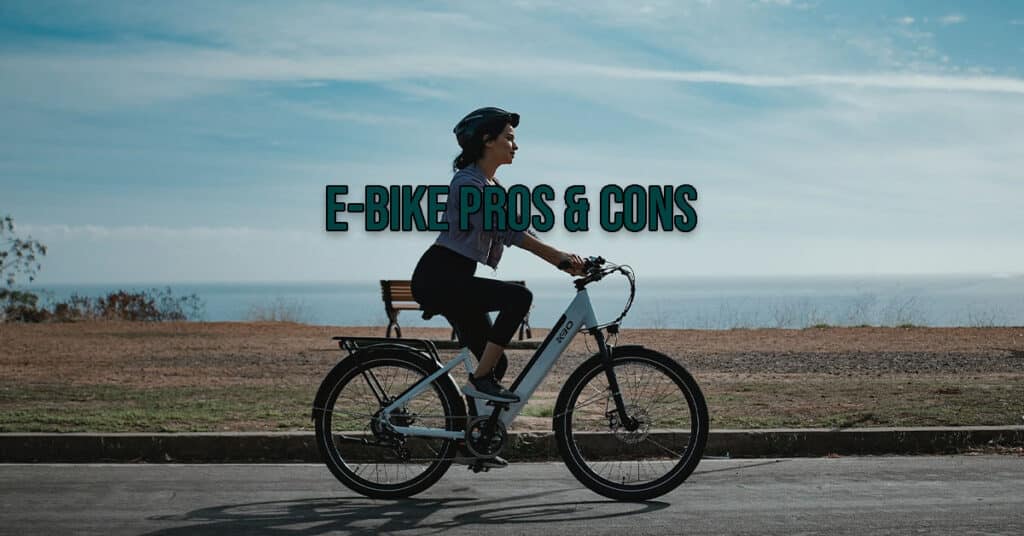 woman with a helmet rides with an electric bikes on a clear day