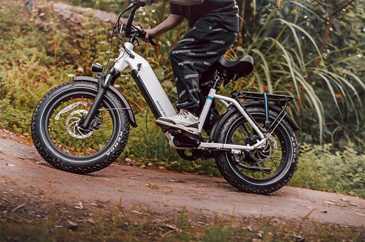 man riding off-road with magicycle ocelot pro ebike