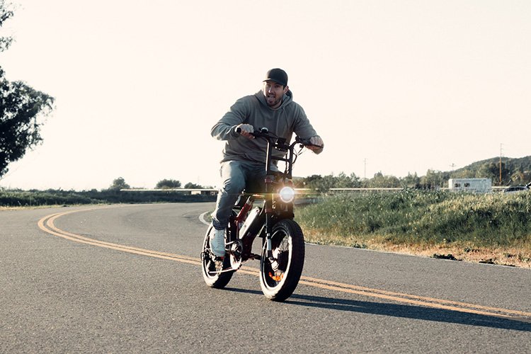 man testing electric bike after making it faster