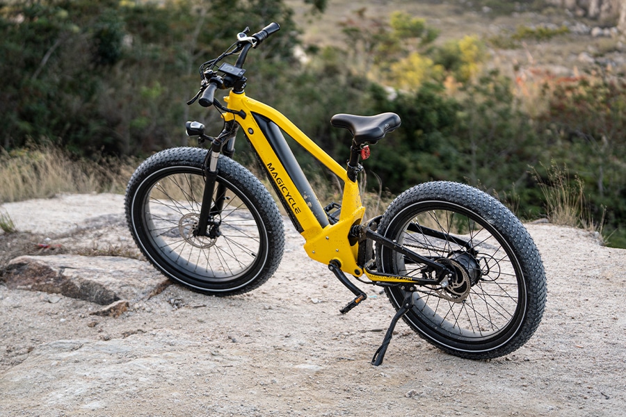yellow magicycle deer electric bike on the gravel