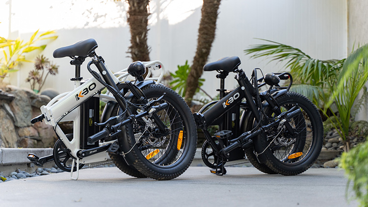 2 kbo electric bikes folded down into very compact size