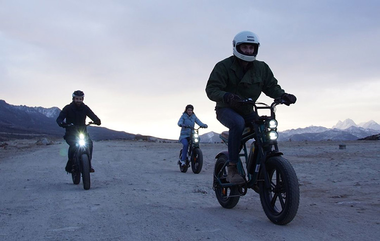 3 people riding with engwe m20 e-bikes