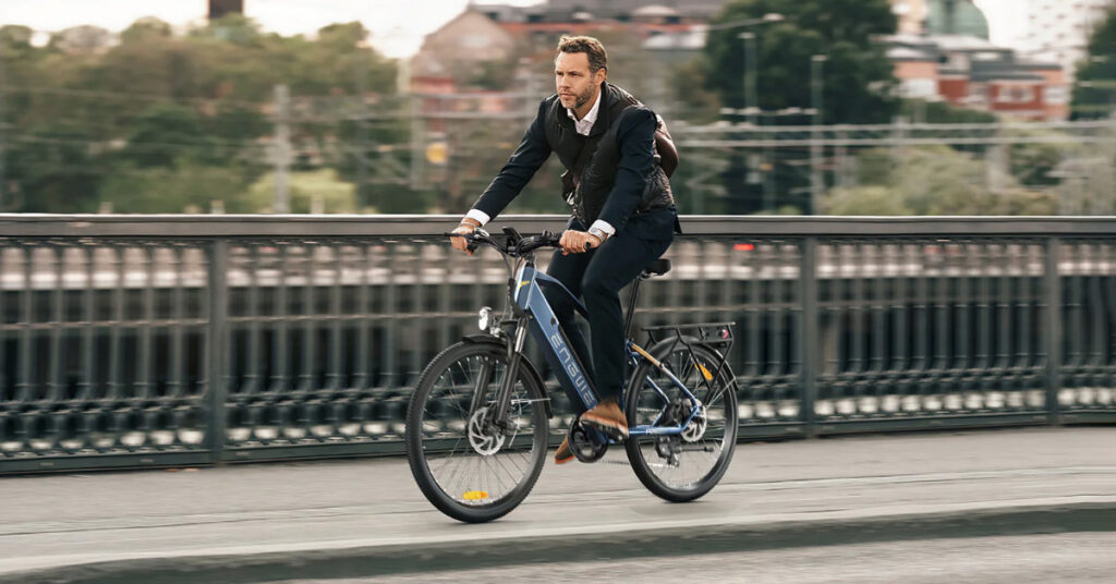 man rides with engwe p26 ebike over the bridge