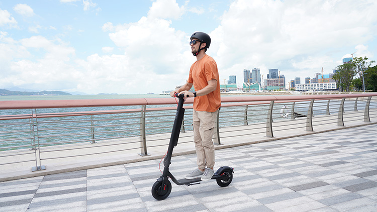man riding with turboant x7 max electric scooter