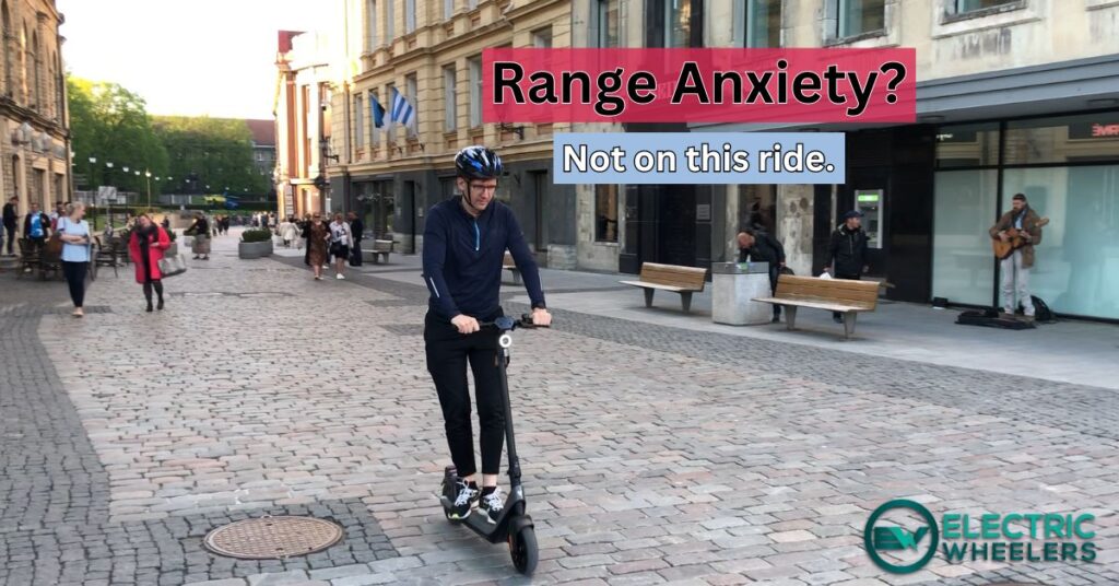 Author of the article testing an electric scooter on the city street