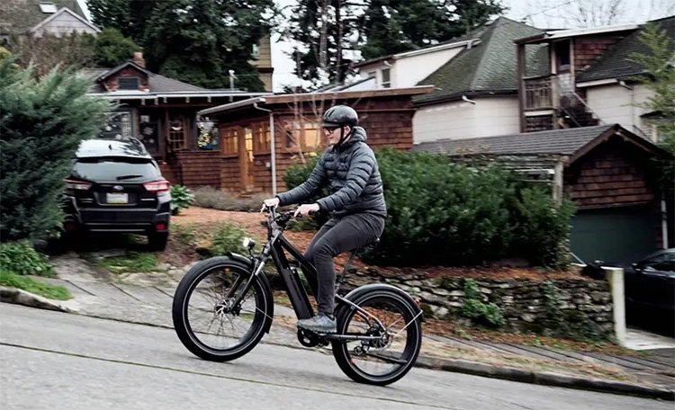 man riding a RadRover 6 Plus on an incline