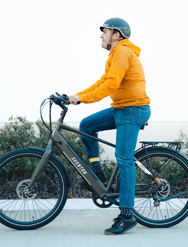 man sitting on an Aventon Pace 500 ebike