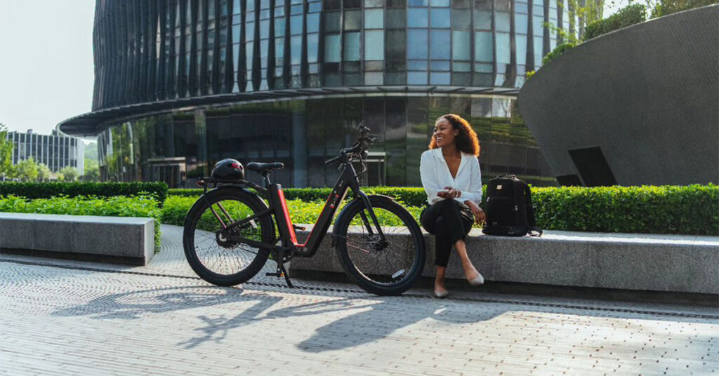 woman reviewing NIU BQi-C3 Pro bike