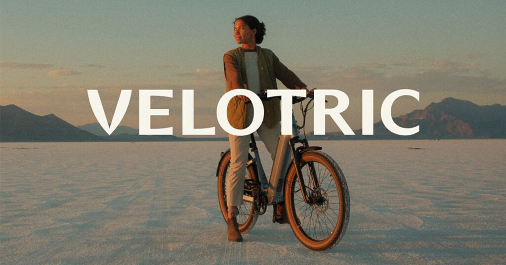 woman riding a velotric electric bike in the desert
