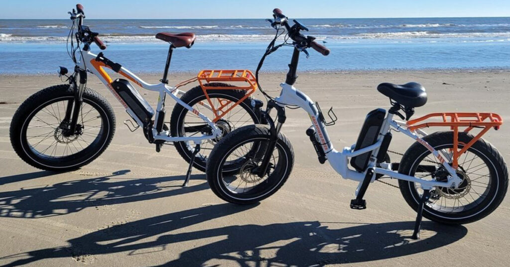 2 rad power bike models at the beach