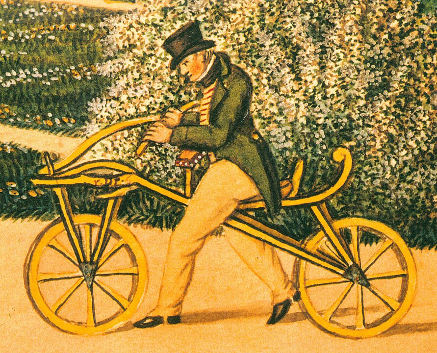 Karl von Dreis on his original wooden velocipede