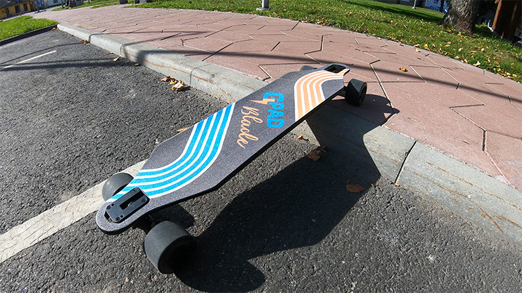 gpad electric skateboard on the curb
