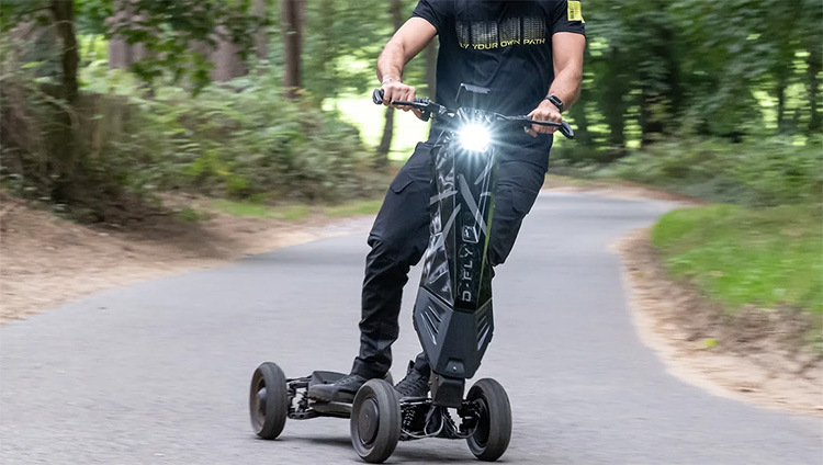 man riding with dragonfly 4-wheel electric scooter