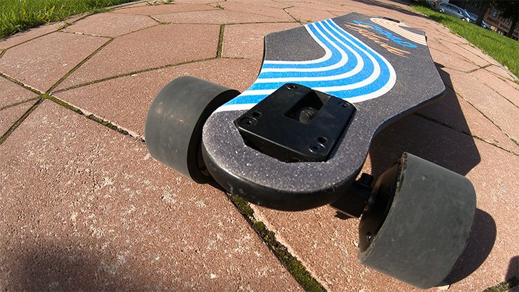 trucks and wheels of an electric skateboard