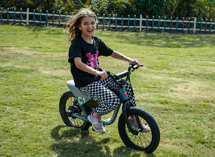 girl is riding with himiway kids ebike