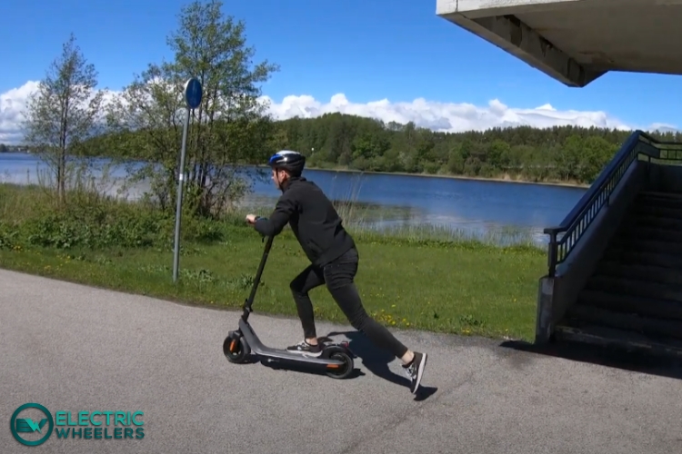 pushing the momentum of electric scooter