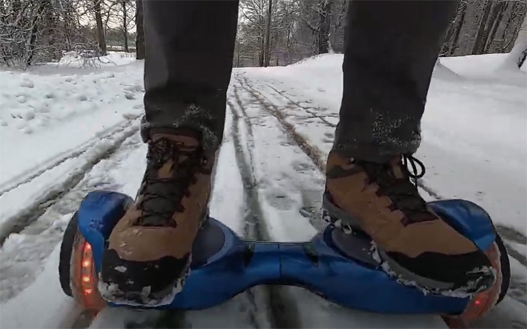 riding a hoverboard in the snow